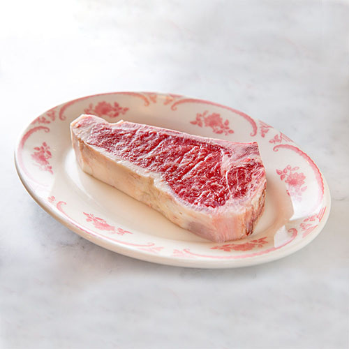 photograph of a t-bone steak